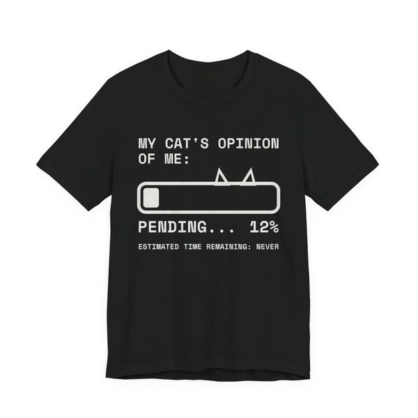 Black t-shirt printed in off-white ink with “My Cat's Opinion of Me:” above a loading bar with cat ears, stuck at “Pending... 12%”, with “Estimated time remaining: never”