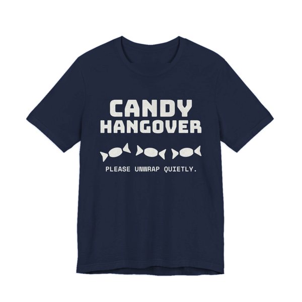 Navy t-shirt printed in off-white ink with “Candy Hangover” above a row of wrapped candies, with “Please unwrap quietly.”