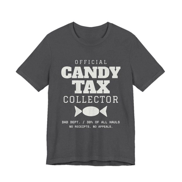 Dark Grey Heather t-shirt printed in off-white ink with “Official Candy Tax Collector” over a wrapped candy, with “Dad Dept. / 30% of all hauls. No receipts. No appeals.”