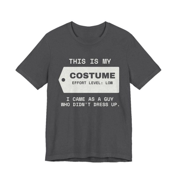 Dark Grey Heather t-shirt printed in off-white ink with “This Is My” above a hang tag reading “Costume, effort level: low”, with “I came as a guy who didn't dress up.”