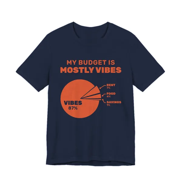 My Budget Is Mostly Vibes tee printed in orange ink on a navy shirt