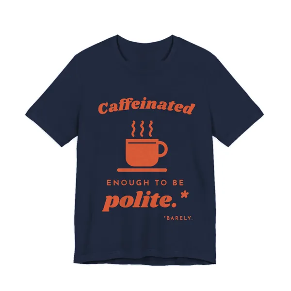 Caffeinated Enough to Be Polite tee printed in orange ink on a navy shirt