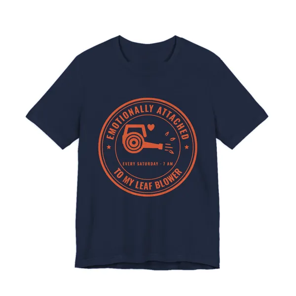 Emotionally Attached to My Leaf Blower tee printed in orange ink on a navy shirt