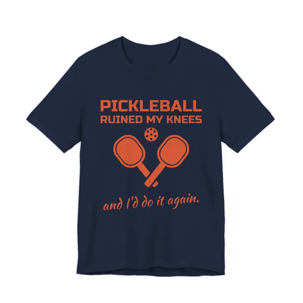 Pickleball Ruined My Knees and I'd Do It Again tee printed in orange ink on a navy shirt