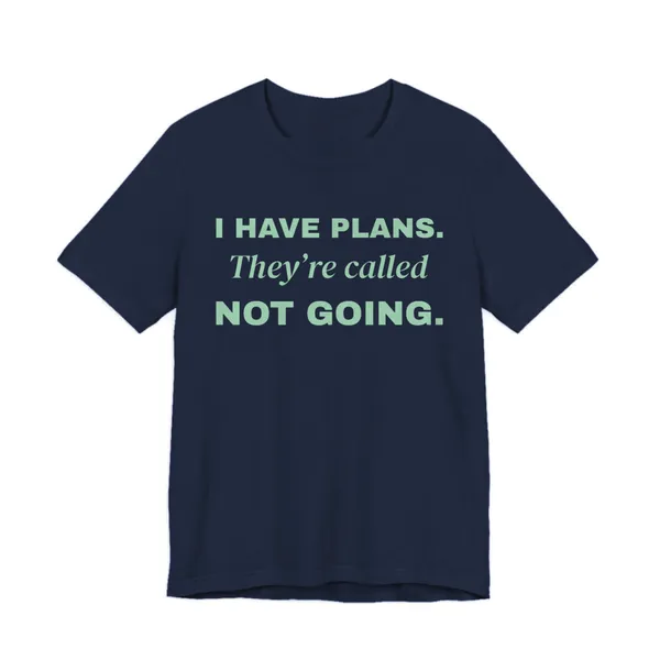 I Have Plans. They're Called Not Going. tee printed in mint green ink on a navy shirt