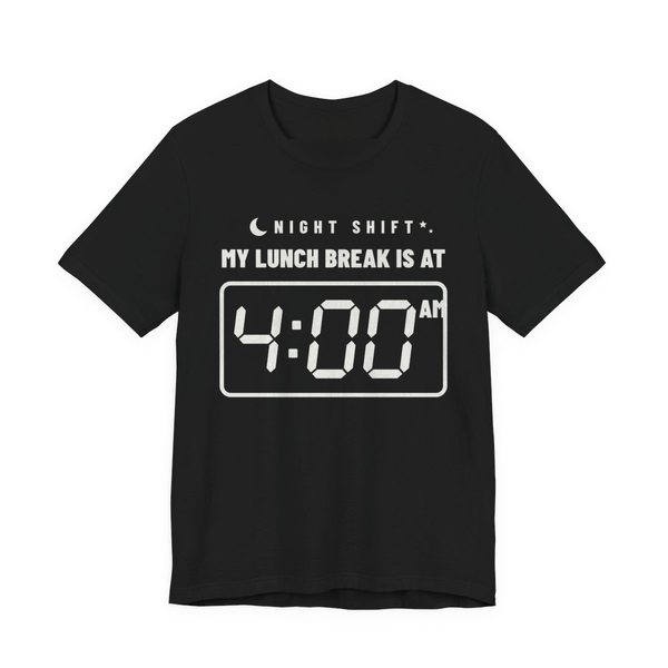 Black t-shirt printed in off-white ink with “Night Shift” with a crescent moon over “My Lunch Break Is At” and a big digital clock reading 4:00 AM