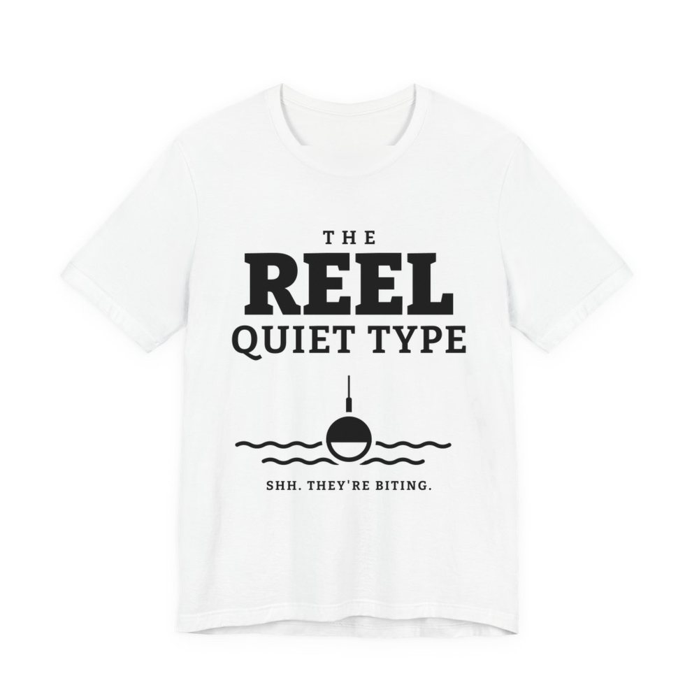 White t-shirt printed in dark ink with “The Reel Quiet Type” above a bobber floating on calm water, with “Shh. They're biting.”