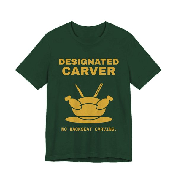 Forest t-shirt printed in gold ink with a crossed carving knife and fork and the words “Designated Carver”